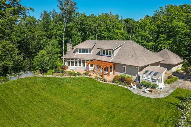front view picture of 4201 N High Bluffs Drive, Leland, MI. 49654