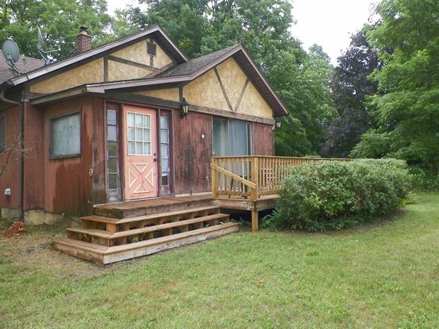 front view picture of 615 River Street, Luther, MI. 49656