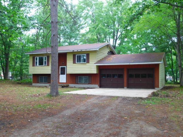 front view picture of 819 Charlene Drive, Kalkaska, MI. 49646
