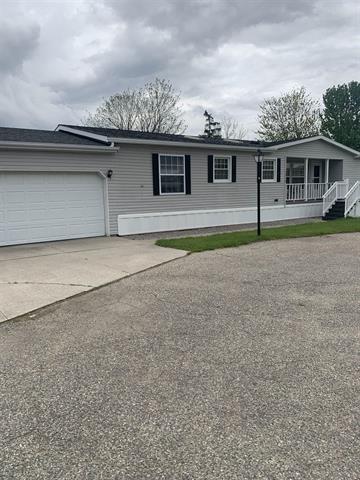 front view picture of 7370 Queens Court, Alma, MI. 48801