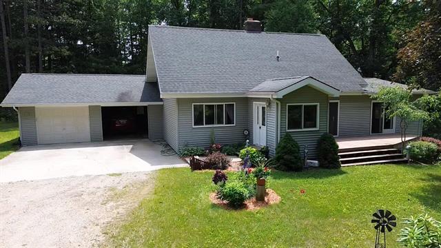 front view picture of 200 S Shearer Road, Gladwin, MI. 48624