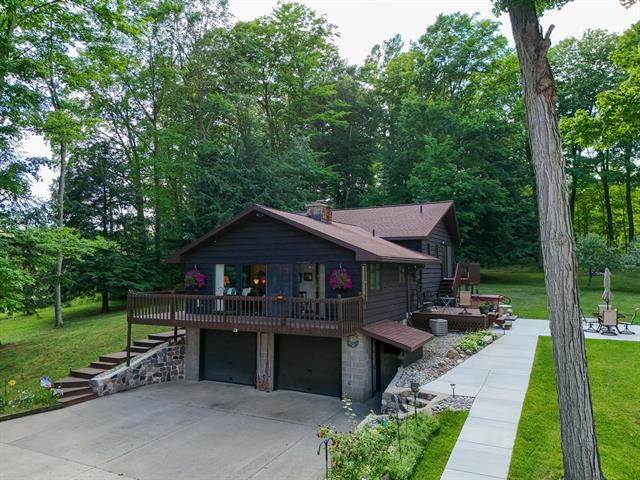 front view picture of 10704 E Old M-63, Luther, MI. 49656