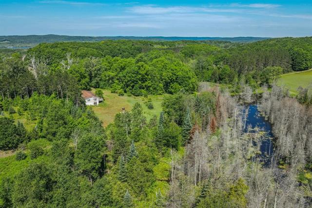 front view picture of 2343 Carpenter Road, Bellaire, MI. 49615