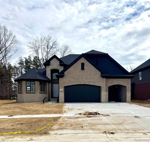front view picture of 0002 Mistwood Drive, Macomb, MI. 48042