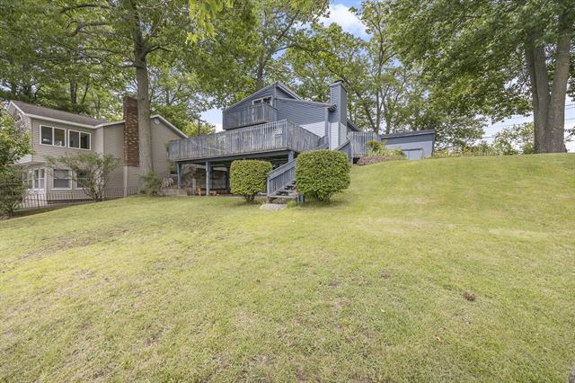 front view picture of 10459 Poplar Drive Ne, Rockford, MI. 49341