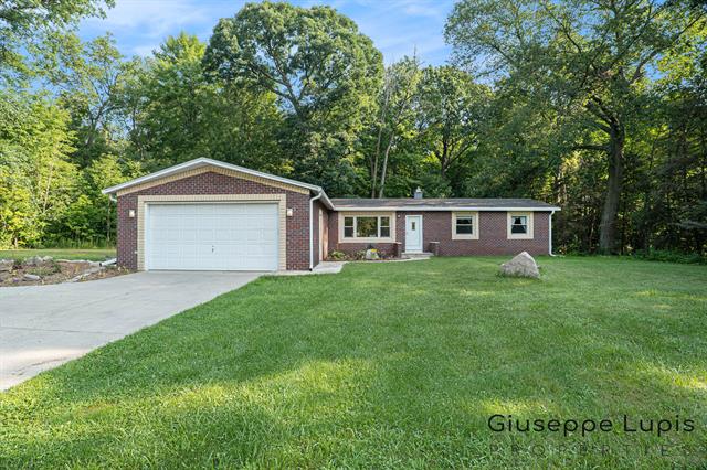front view picture of 6145 10 Mile Road Ne, Rockford, MI. 49341