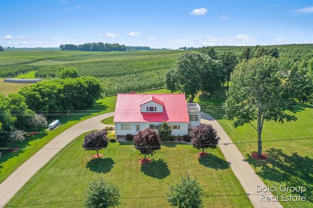 front view picture of 8945 Fruit Ridge Avenue Nw, Sparta, MI. 49345