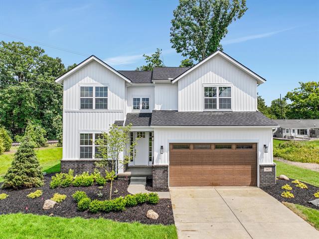 front view picture of 667 Allegheny Drive, South Lyon, MI. 48178