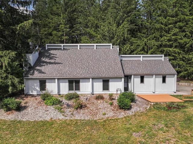 front view picture of 100 Greenridge Drive, Cadillac, MI. 49601