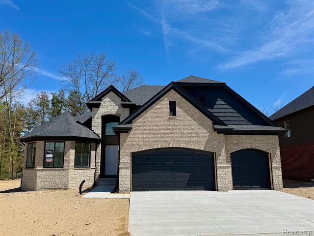 front view picture of 50734 Mistwood Drive, Macomb, MI. 48042