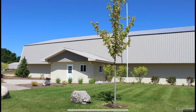 front view picture of 6920 Albatross Avenue, Kewadin, MI. 49648