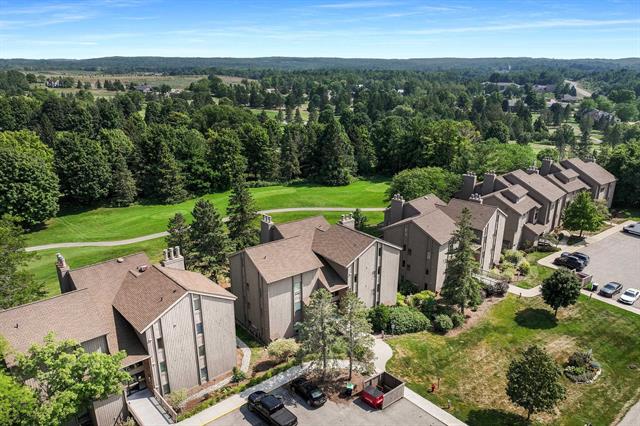 front view picture of 5536 Golfview Court, Williamsburg, MI. 49690