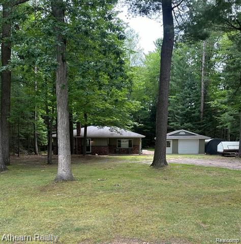 front view picture of 1111 Woodsdale Drive, Prudenville, MI. 48651