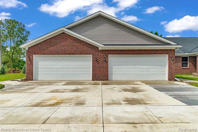 front view picture of 303 Hidden Harbor, Marine City, MI. 48039