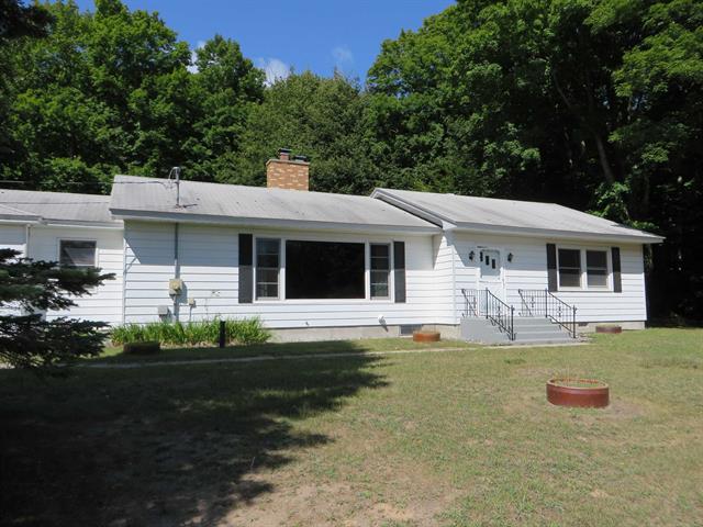 front view picture of 7548 S Dune Highway, Empire, MI. 49630