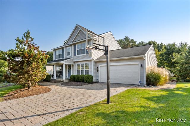 front view picture of 9660 Sunset Ridge Drive, Rockford, MI. 49341