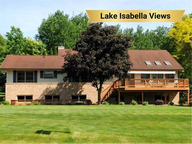 front view picture of 1000 Circle Drive, Weidman, MI. 48893
