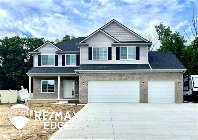 front view picture of 8353 Peninsula Circle, Grand Blanc, MI. 48439