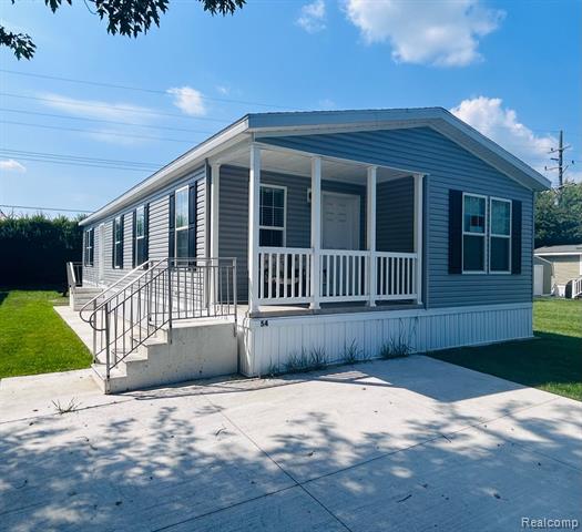 front view picture of 6103 Lakeshore #54 Road, Lexington, MI. 48450