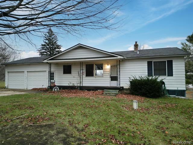 front view picture of 444 Cemetery Road, Otisville, MI. 48463