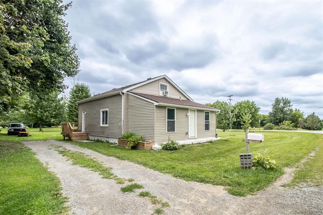 front view picture of 12525 Irish Road, Otisville, MI. 48463