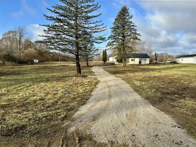 front view picture of 5707 10 Mile Rd Road, Burlington, MI. 49029