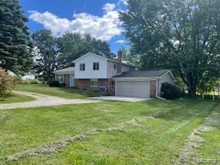 front view picture of 10348 Green Road, Goodrich, MI. 48438