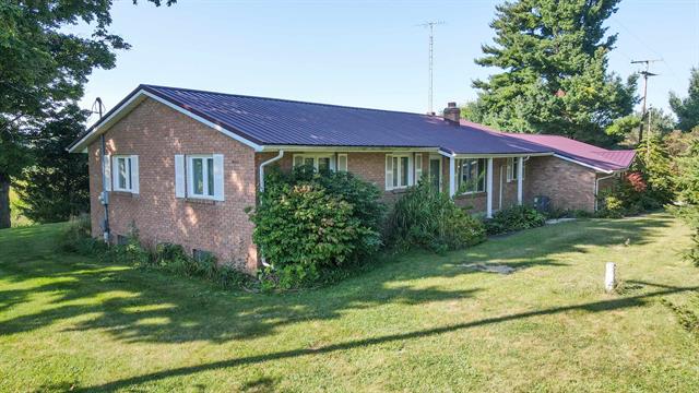front view picture of 3412 E Sanilac Road, Mayville, MI. 48744