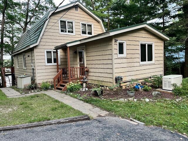 front view picture of 10735 Black Bear Road Ne, Kalkaska, MI. 49646
