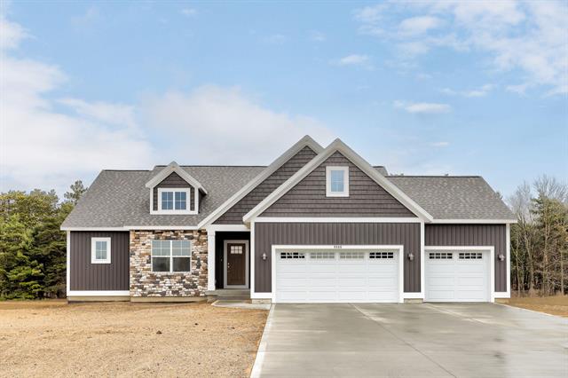 front view picture of 9566 Shoreway Drive, West Olive, MI. 49460