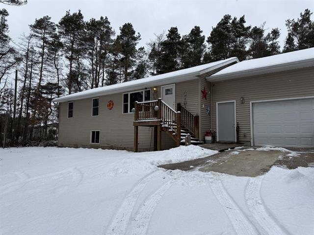 front view picture of 21926 1 Mile Road, Morley, MI. 49336