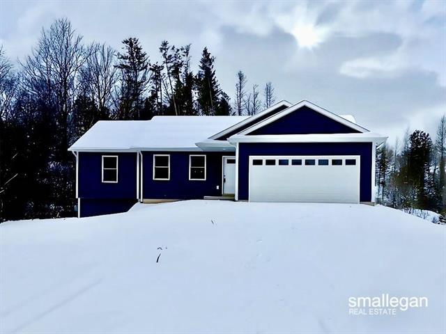 front view picture of 13124 Spruce Ridge Drive, Gowen, MI. 49326