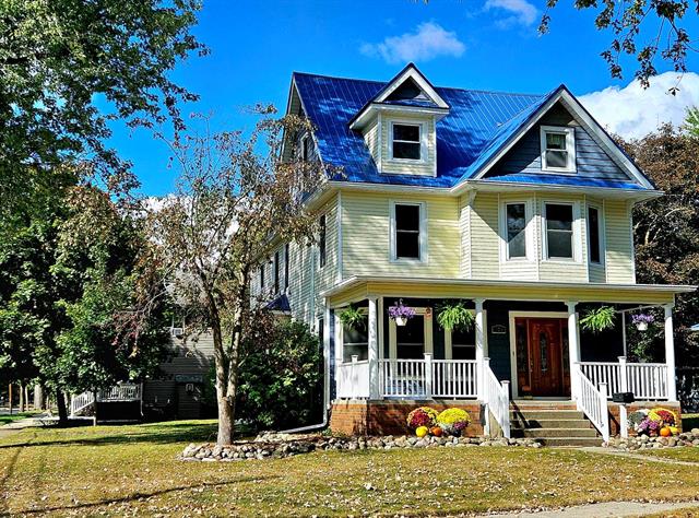 front view picture of 703 N River, Alma, MI. 48801