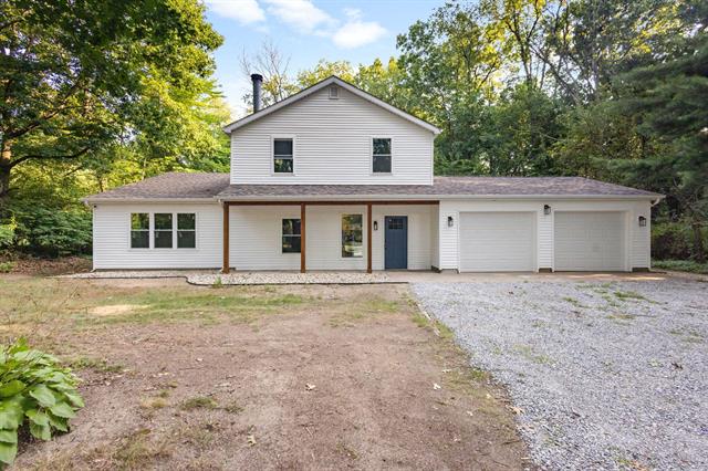front view picture of 25590 Redfield Road, Edwardsburg, MI. 49112