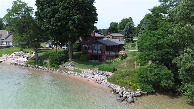 front view picture of 12305 Third Street, Kewadin, MI. 49648