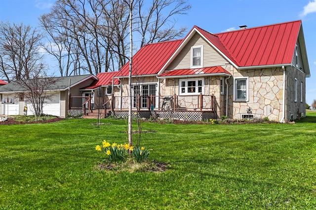front view picture of 4652 Cairn Highway, Kewadin, MI. 49648