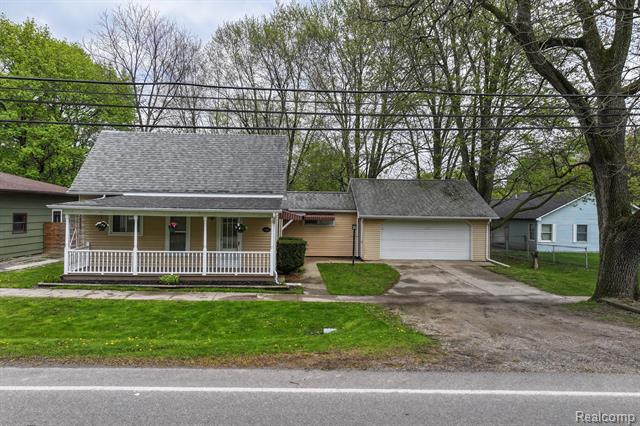 front view picture of 3883 N Mill Road, Dryden, MI. 48428