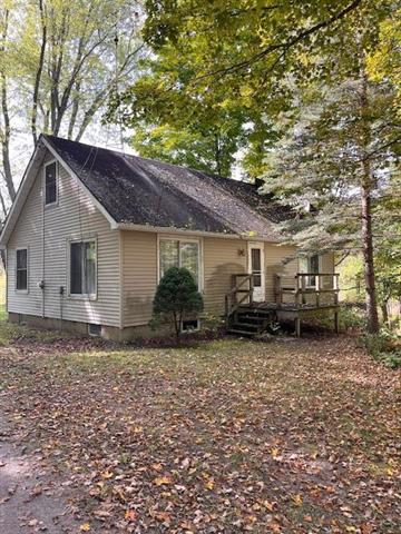 front view picture of 1487 Seath Lane, Evart, MI. 49631
