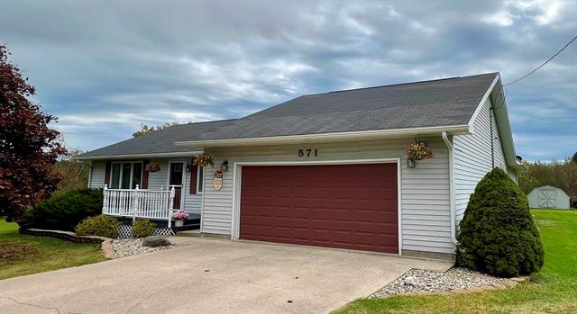 front view picture of 571 Sparton Road, Tawas City, MI. 48763
