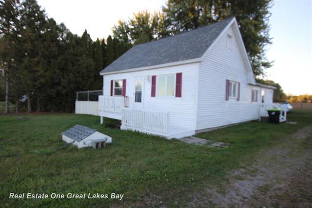 front view picture of 4141 Sagatoo Road, Standish, MI. 48658