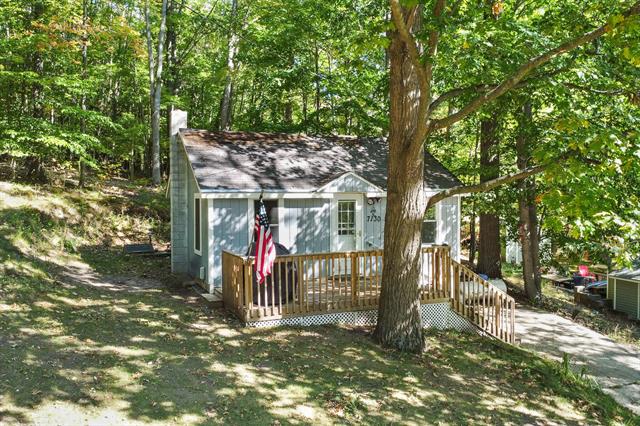 front view picture of 7130 N Poplar Road, Free Soil, MI. 49411
