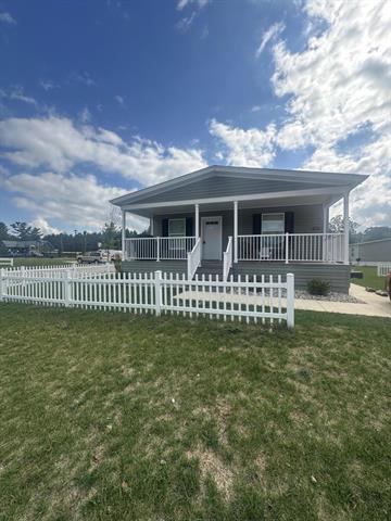 front view picture of 83 Viking Drive Nw, Sparta, MI. 49345