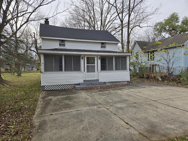front view picture of 25438 4Th Street, Grosse Ile, MI. 48138