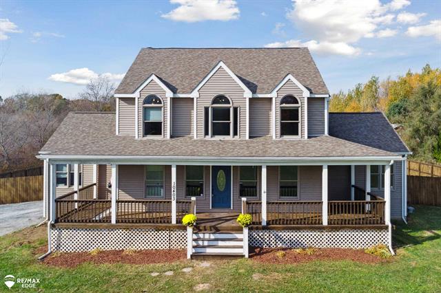 front view picture of 10403 Irish Road, Otisville, MI. 48463