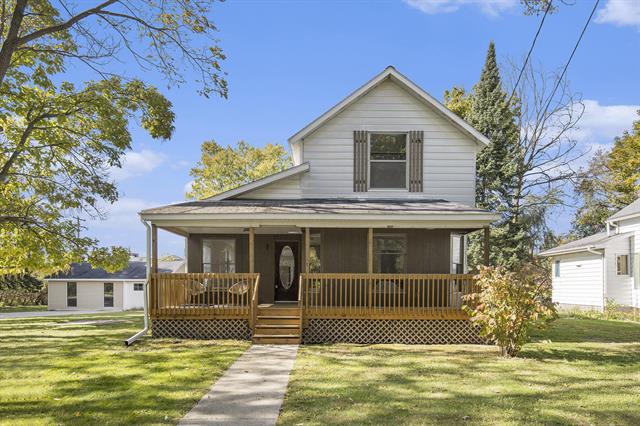 front view picture of 65 N Lake Street, Grant, MI. 49327