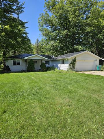 front view picture of 851 Oren Court, Gladwin, MI. 48624
