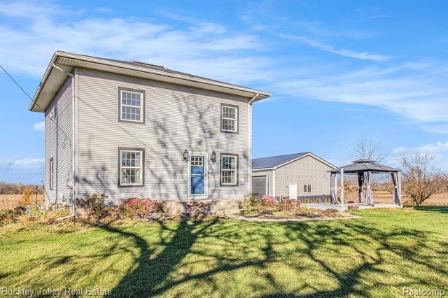 front view picture of 11502 Bell Oak Road, Webberville, MI. 48892