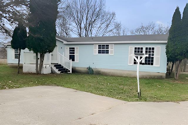 front view picture of 6220 Riverside Drive, Saranac, MI. 48881