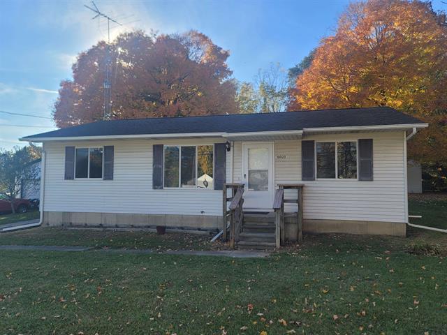 front view picture of 10023 Stover Road, Otisville, MI. 48463