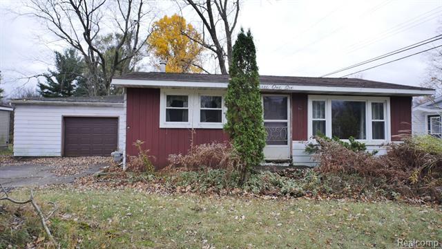 front view picture of 316 Monroe Street, Webberville, MI. 48892